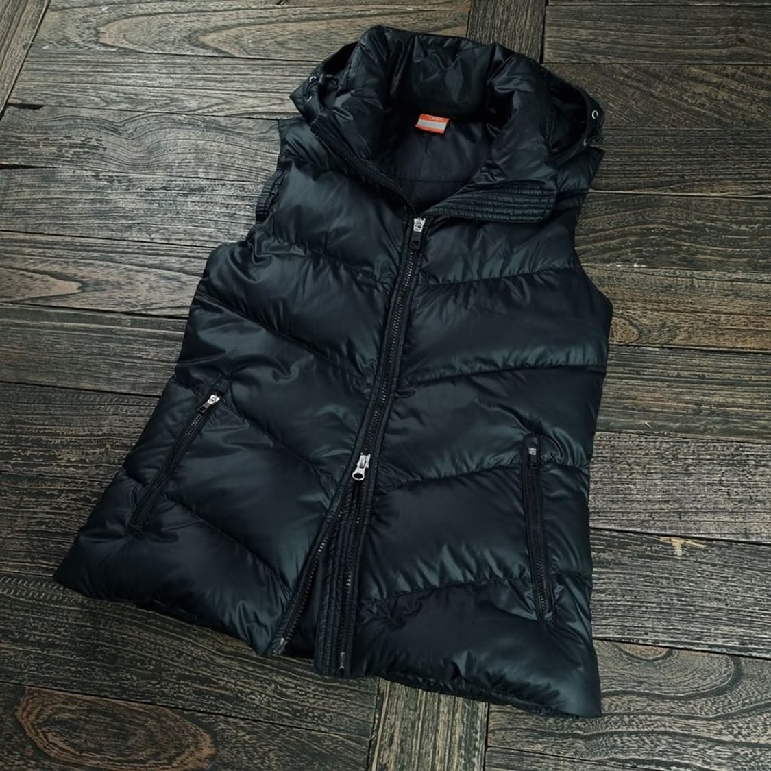 [나이키] 스우시 프린팅 덕다운 후드 패딩 베스트 조끼 블랙 M18287 상품이미지1