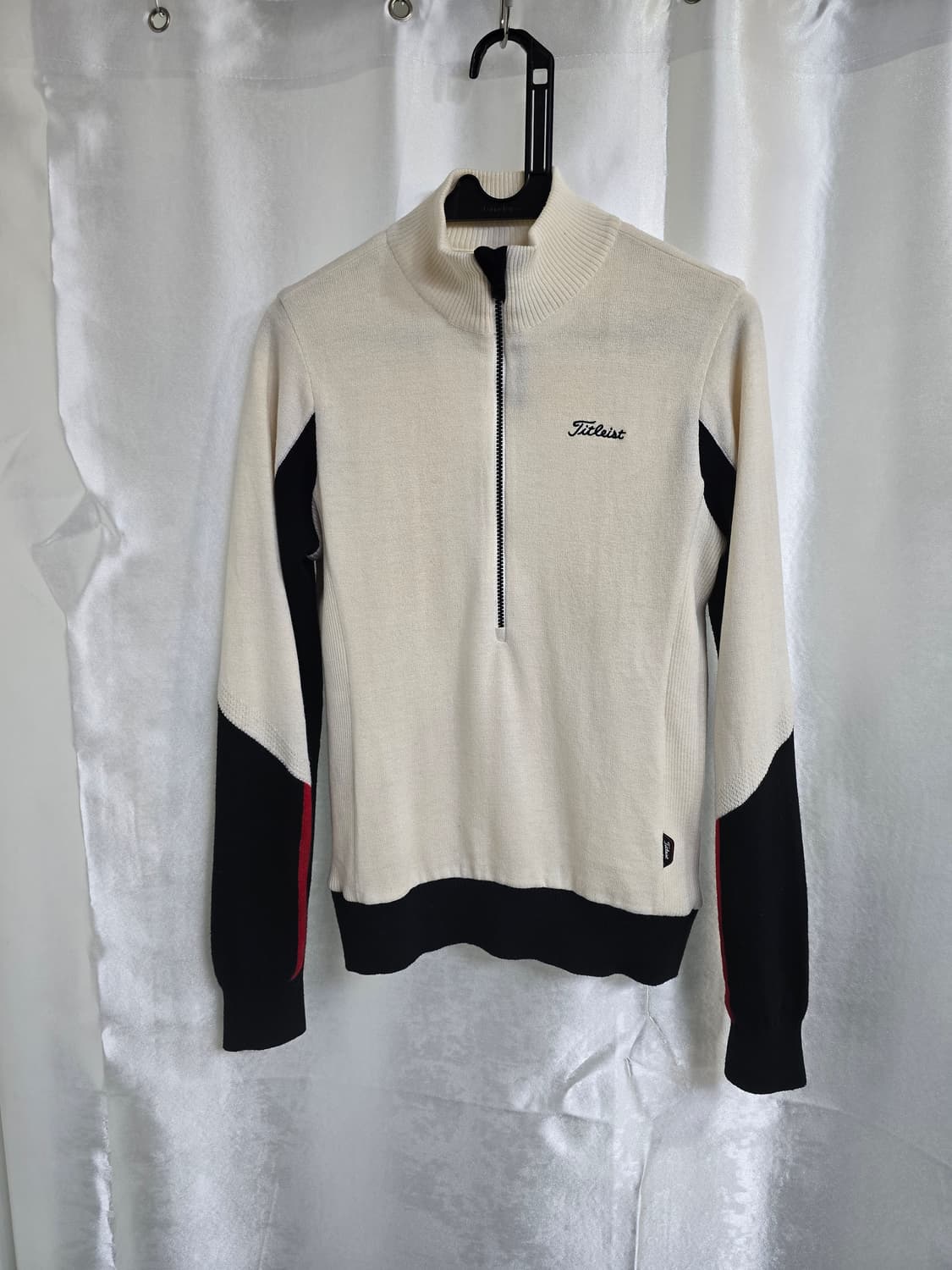 타이틀리스트 여성 하프넥 바람막이 스웨터 (1982) 상품이미지1