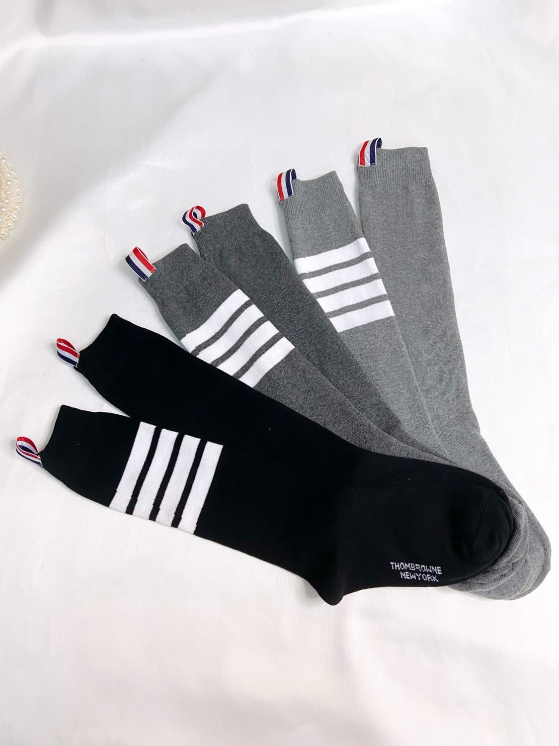 톰브라운 라이트웨이트 코튼 사선 미드카프 삭스 네이비 상품이미지1