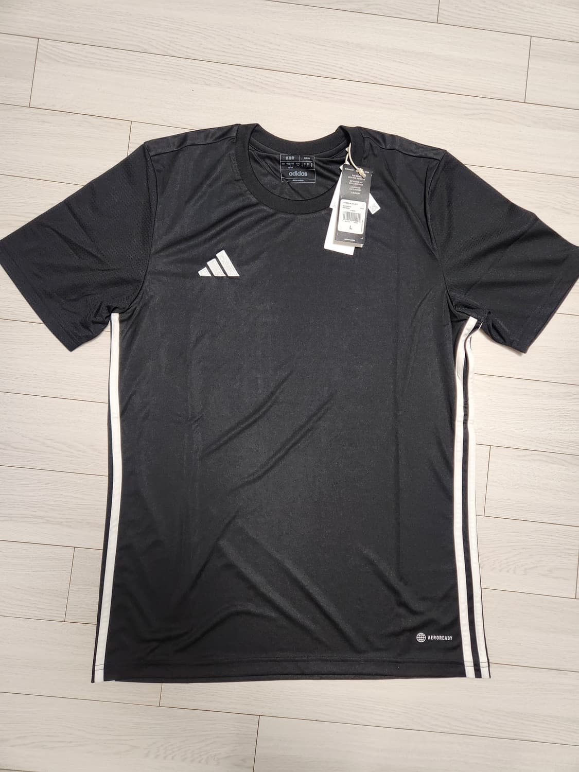 새상품)아디다스 타벨라 23 반팔 져지 블랙  사이즈L

블랙 색상 아디 상품이미지1