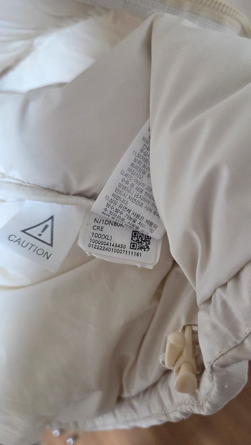 노스페이스 화이트 라벨 노벨티 눕시 다운 자켓 크림 상품이미지6