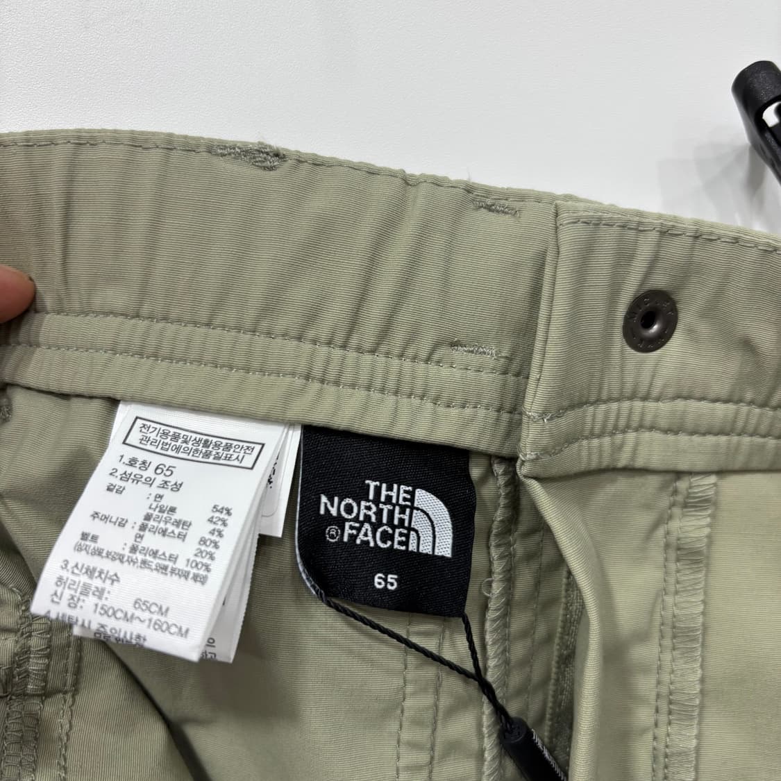 (W)The North Face  기어 업 디테 쳐블 듀얼 스커트 카키 상품이미지7