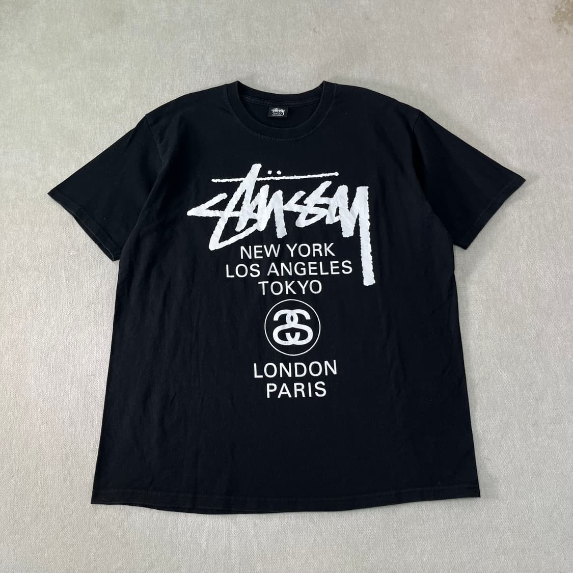 105 스투시 월드투어 블랙 반팔 티셔츠 상품이미지1