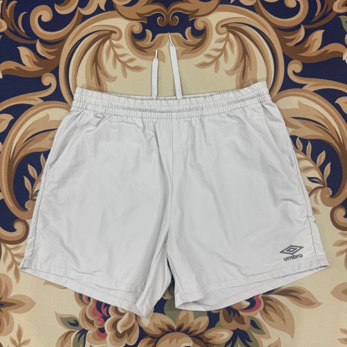 (XL)엄브로 UMBRO 베이직로고 우븐 반바지(라이트그레이) 상품이미지1