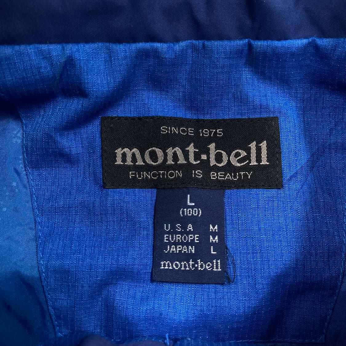 몽벨 블루 컬러 스몰 로고 바람막이 상품이미지4
