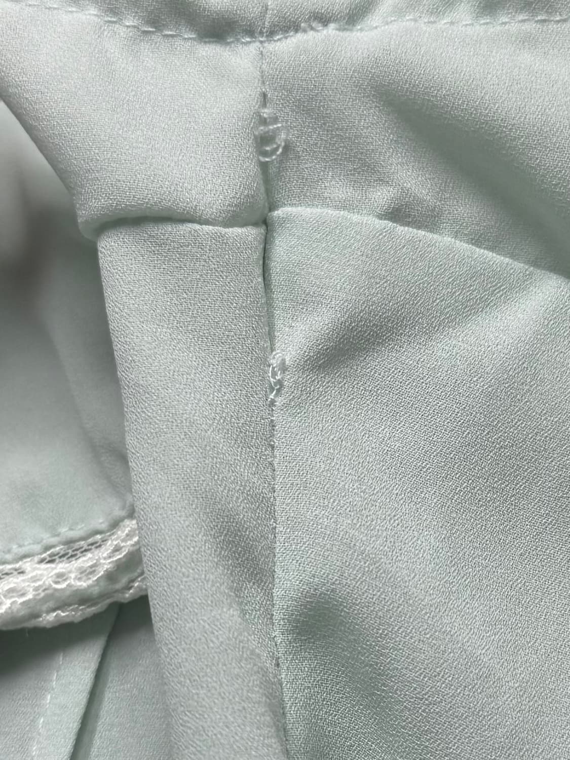 앙크루즈 민트 프릴 로걀 탑 상품이미지2