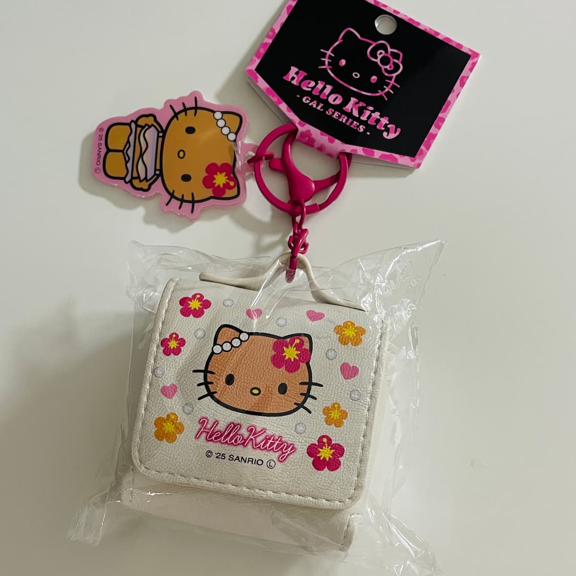 헬로키티 태닝 에어팟 이어폰 케이스 파우치 키링 상품이미지2