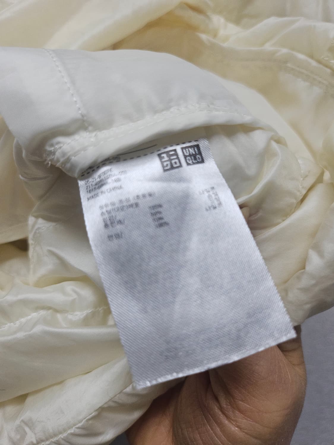 유니클로 경량 패딩 베스트 아이보리 S 상품이미지3