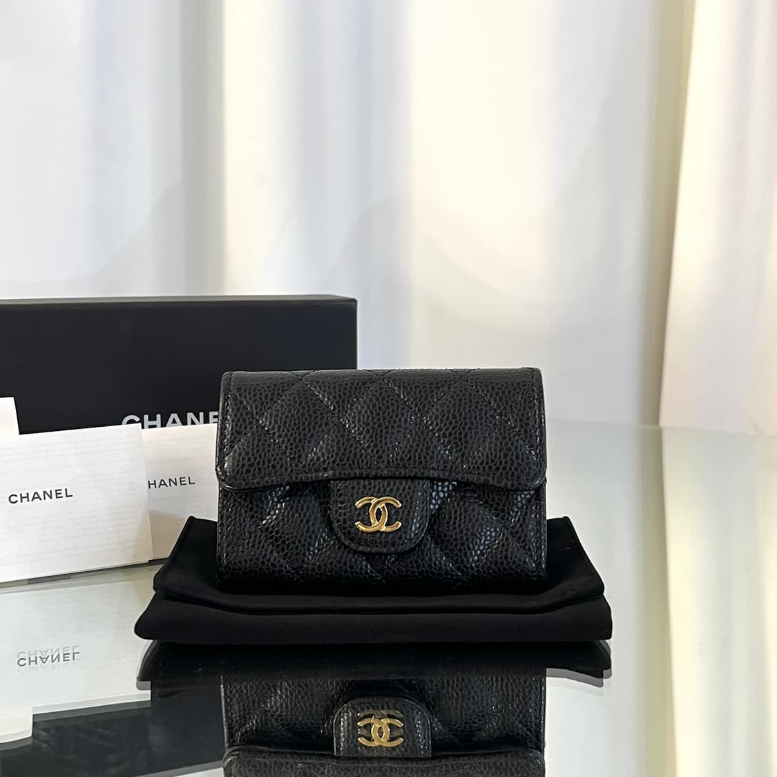 [새상품급] 샤넬 캐비어 클래식 똑딱이 카드지갑 블랙 금장 상품이미지1