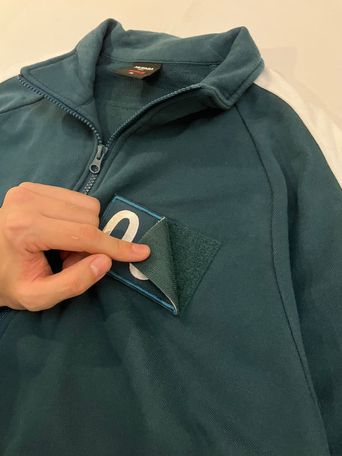 무신사 X 넷플릭스 오징어게임 오일남 001 져지 상품이미지2