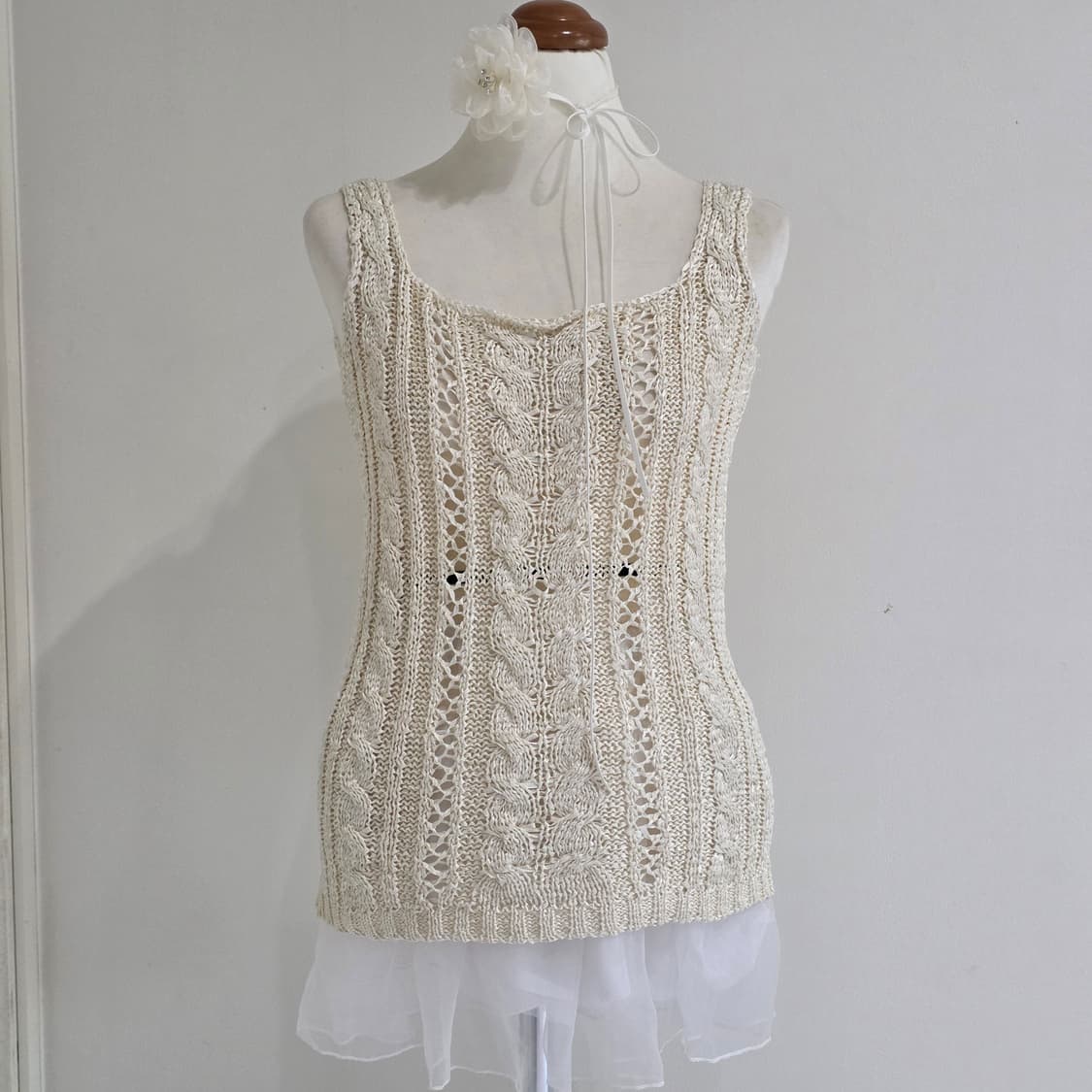 뉴욕빈티지) 아이보리 모리걸 케이블 슬리브리스 니트 시스루탑 상품이미지1