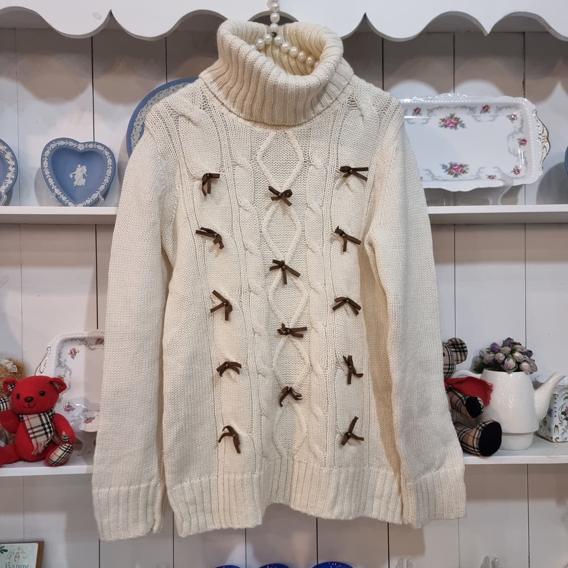 갤러리 비스콘티 GALLERY VISCONTI 리본 케이블 터틀넥 니트 상품이미지1