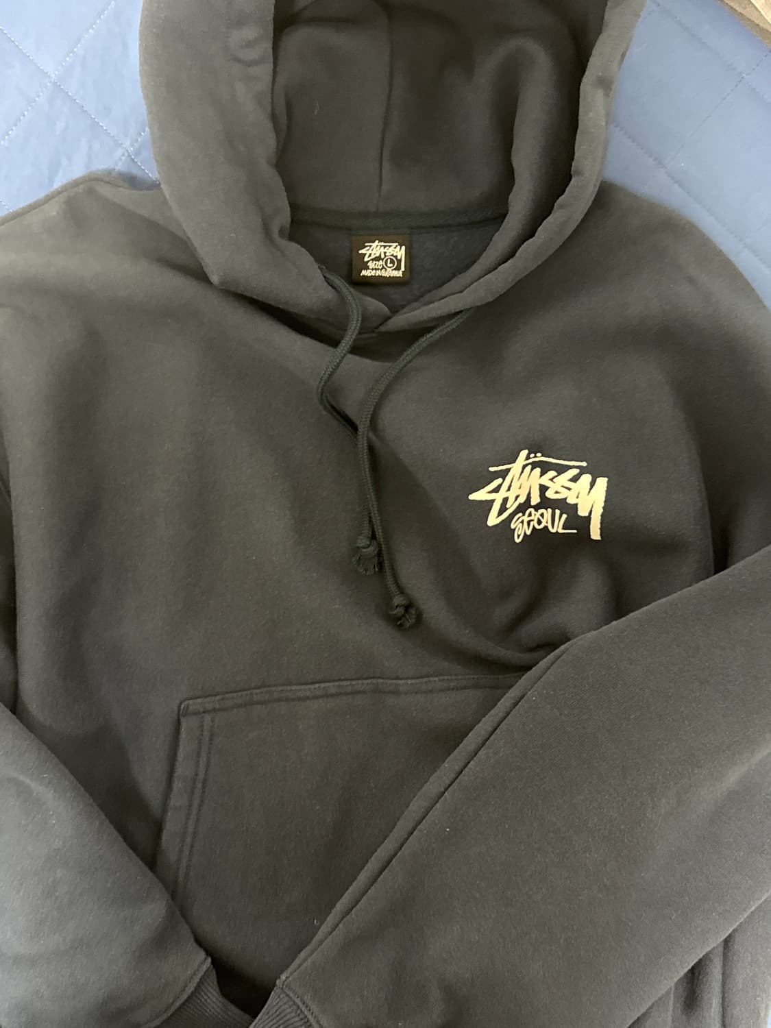 스투시 서울2025네이비 후드티 상품이미지1