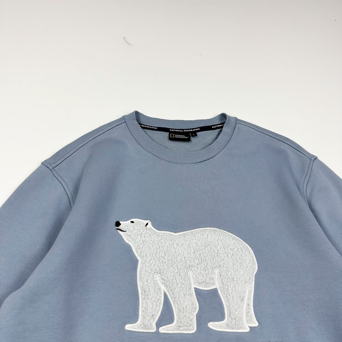 내셔널지오그래픽 와펜 라이트 블루 맨투맨 (L) 상품이미지1