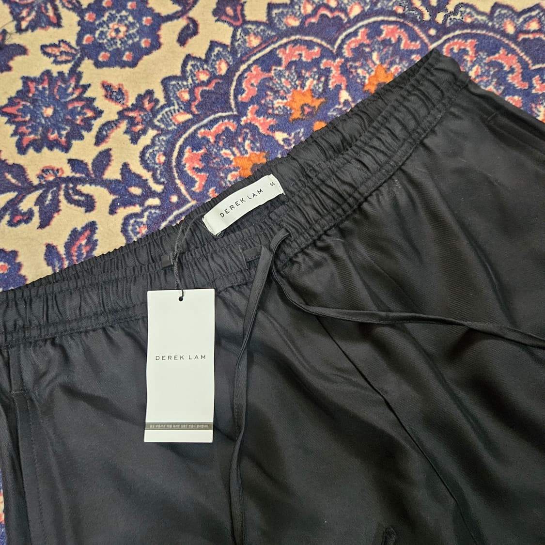 (미사용)데렉램(DEREKLAM) 20ss 아세테이트 유광 밴딩 팬츠 상품이미지4