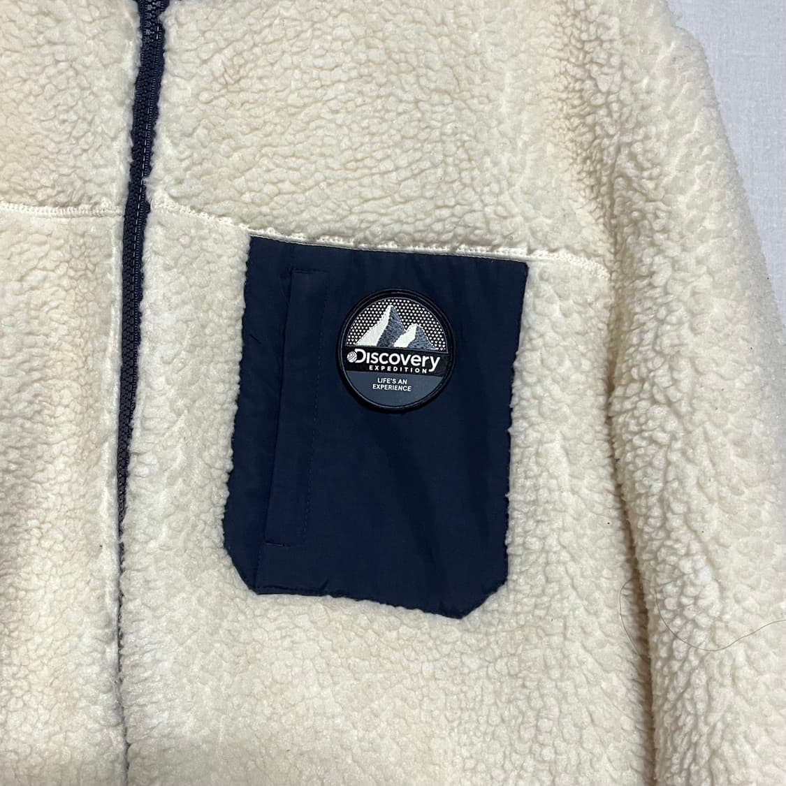 디스커버리 아이보리 뽀글이 롱 후리스 100 상품이미지4