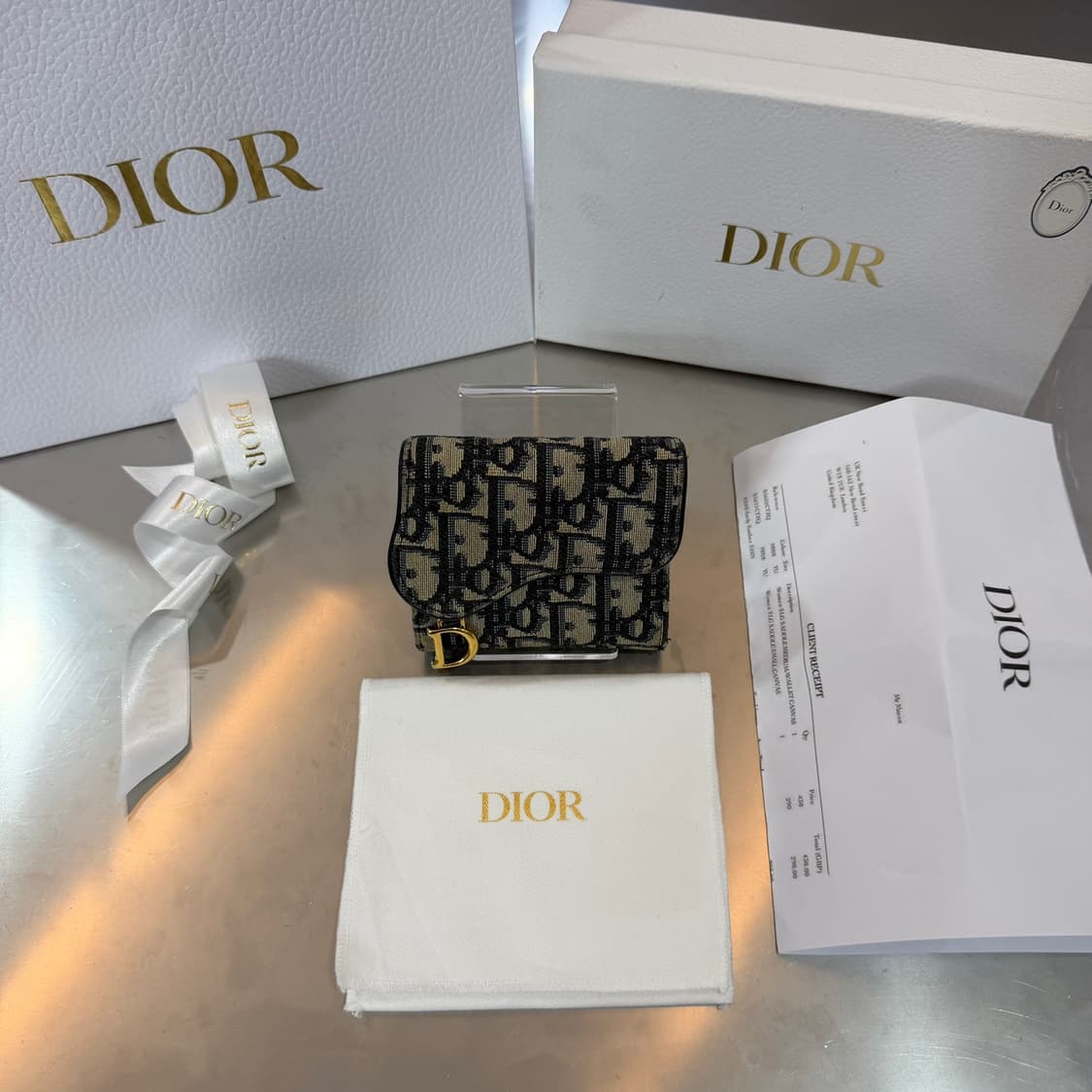 [리오브] 디올 오블리크 새들 반지갑 상품이미지1