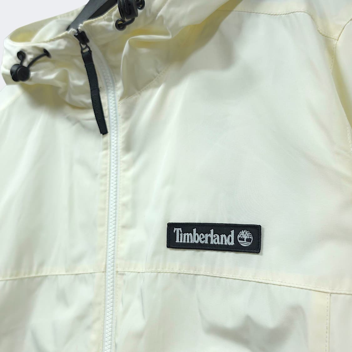 [XL] 팀버랜드 화이트/아이보리 빅로고 후드 오버핏 바람막이 상품이미지4