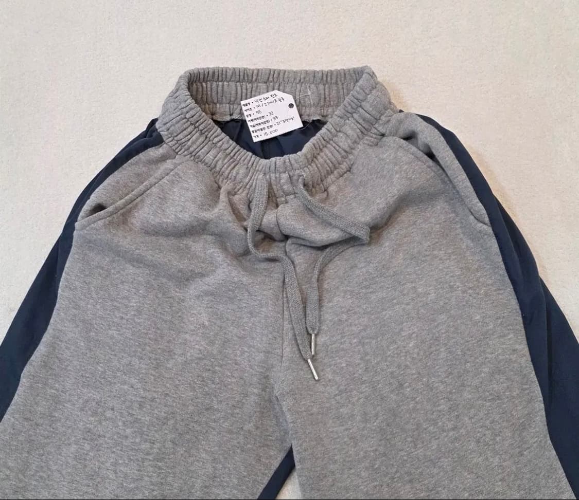 반전 소재 스트링 와이드 트레이닝팬츠 상품이미지1