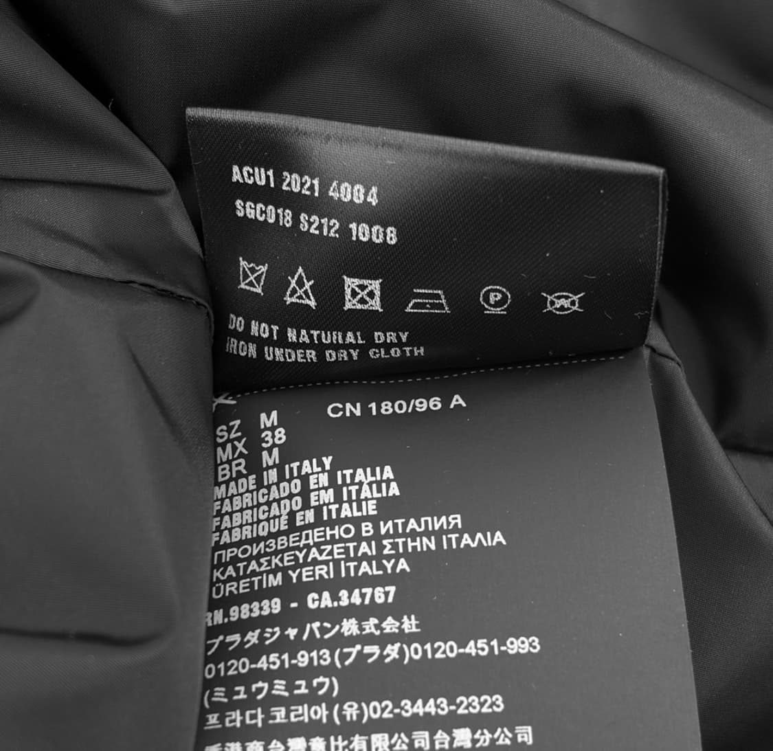 [M] 프라다 자수로고 울 캐시미어 니트 다운 후드 패딩 자켓 화이트 상품이미지9