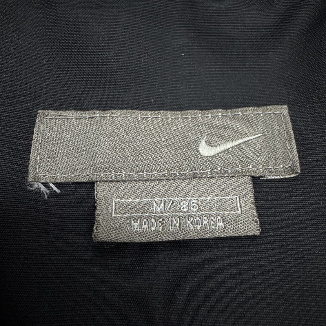 나이키 00s 스우시 뉴챔프 패딩 블랙 상품이미지4