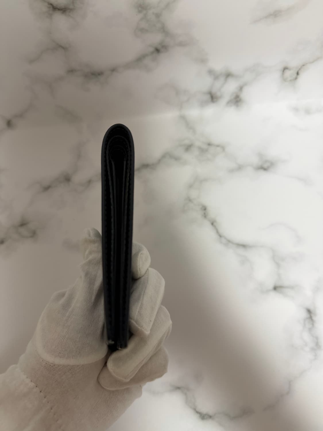 루이비통 멀티플 월릿 타이가 반지갑 상품이미지3