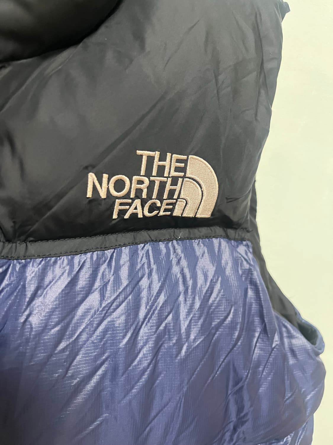 노스페이스 700 눕시 패딩 베스트 네이비/블랙 상품이미지2