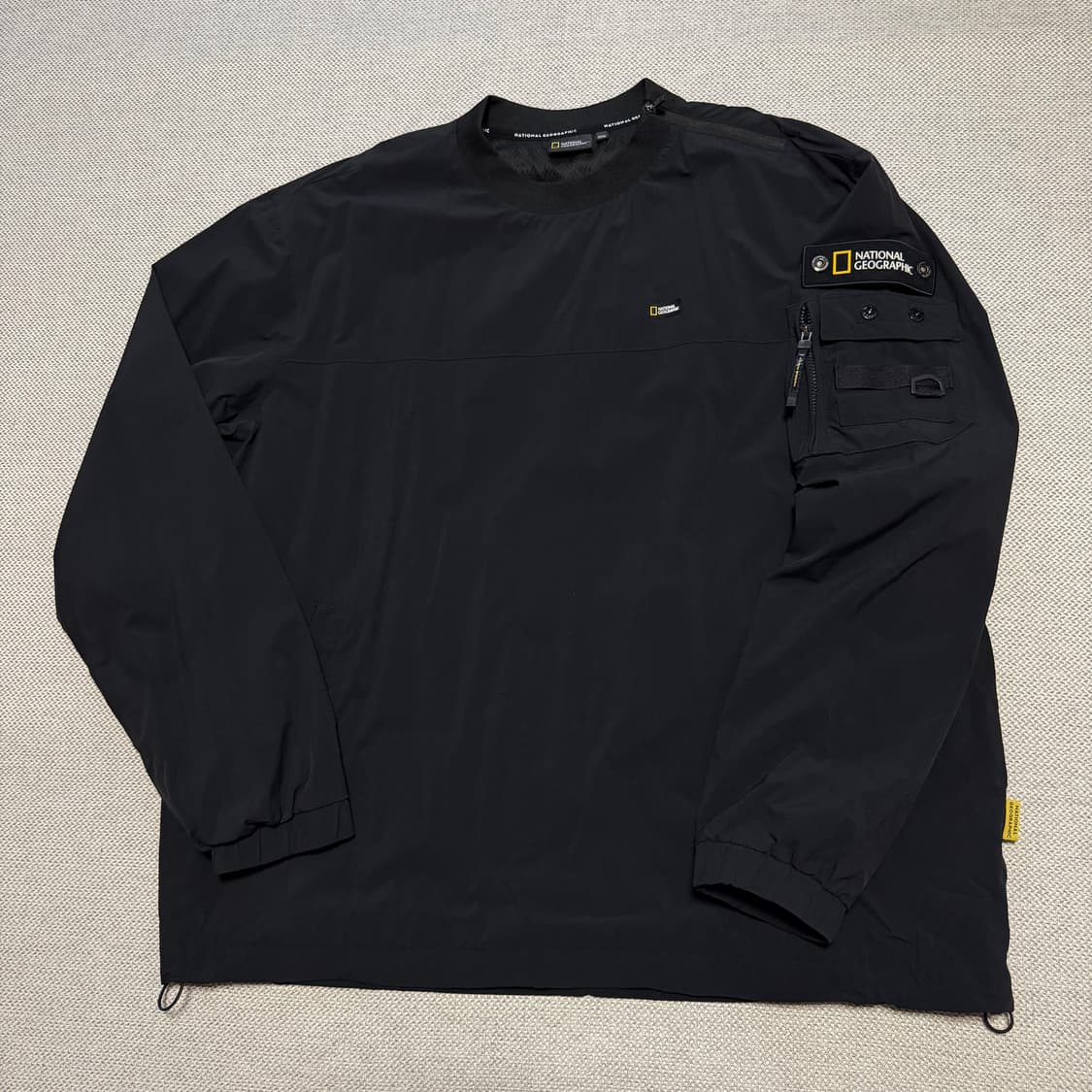 내셔널지오그래픽 우븐 사이드포켓 웜업 상품이미지1