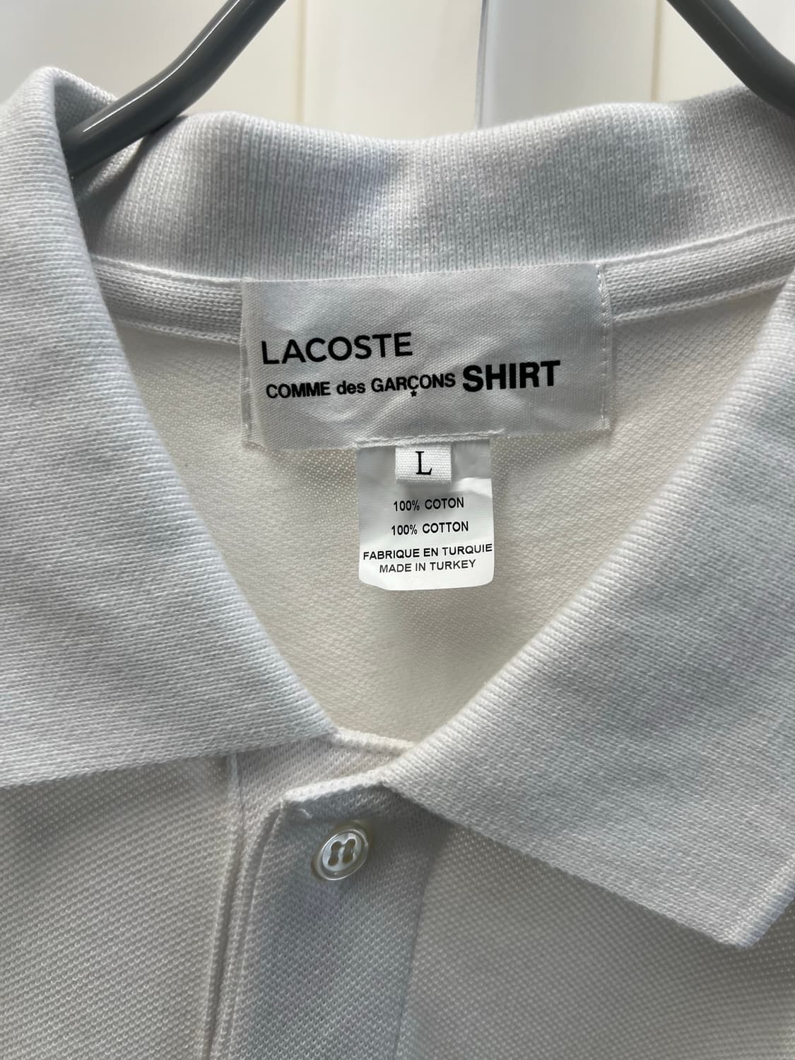 라코스테X꼼데가르숑 화이트 폴로티 상품이미지2