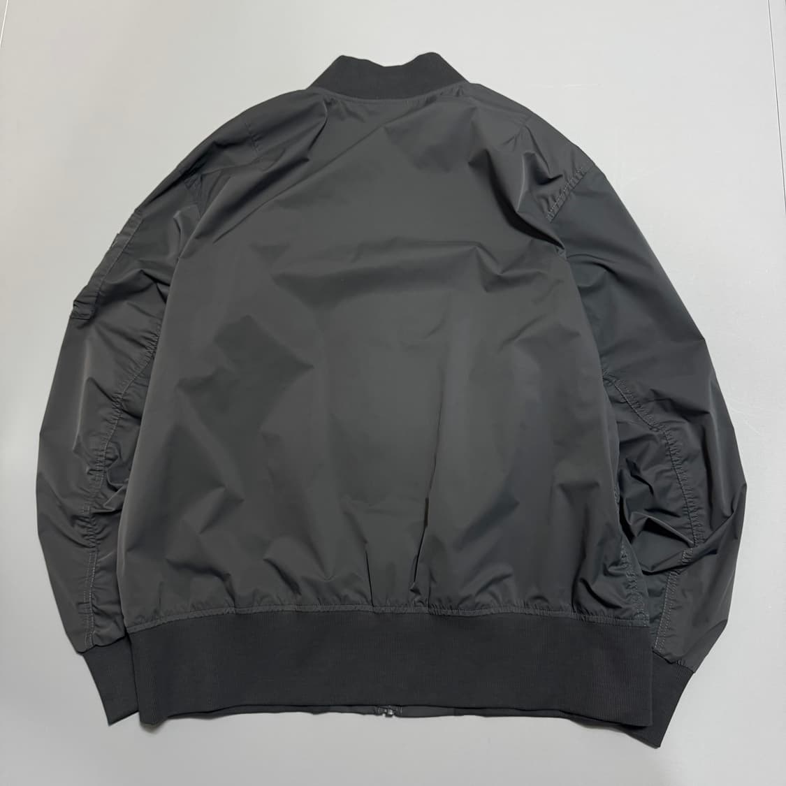 오클리(OAKLEY) 차콜컬러 폴리에스터 논칼라 쉘 플라이트 자켓 상품이미지6