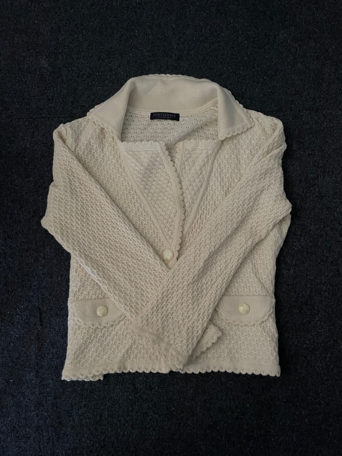 아이보리 커브드 니트 상품이미지1