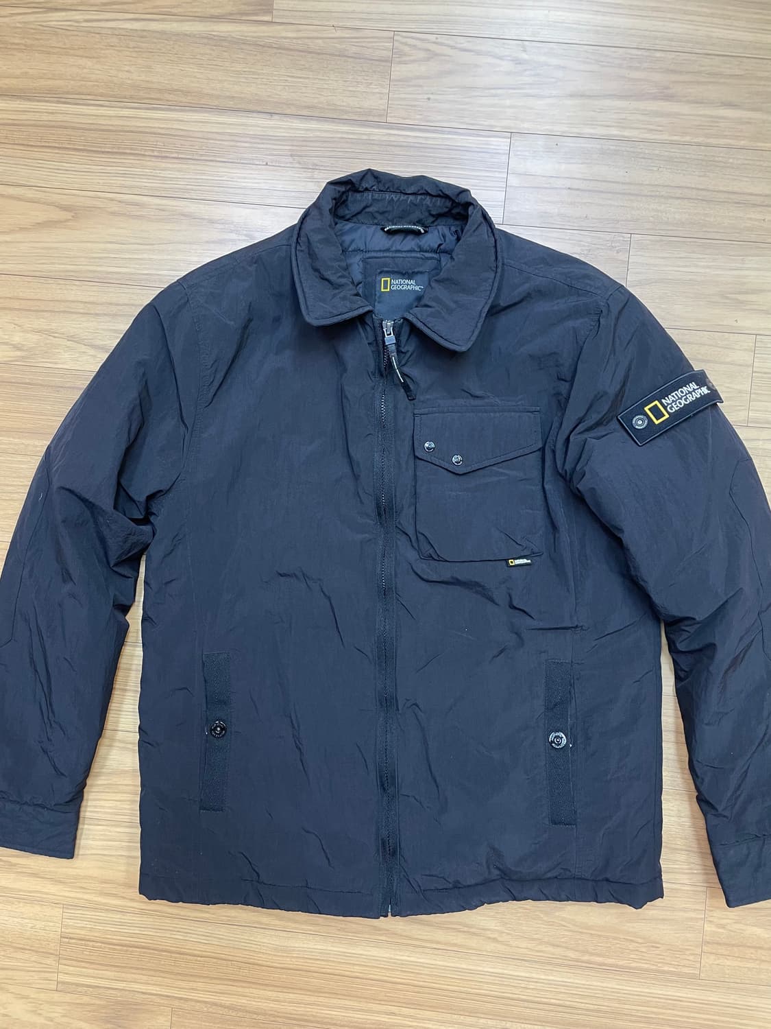 내셔널지오그래픽 경량 점퍼 블랙 색상 L 사이즈입니다. N214M 모델이 상품이미지1