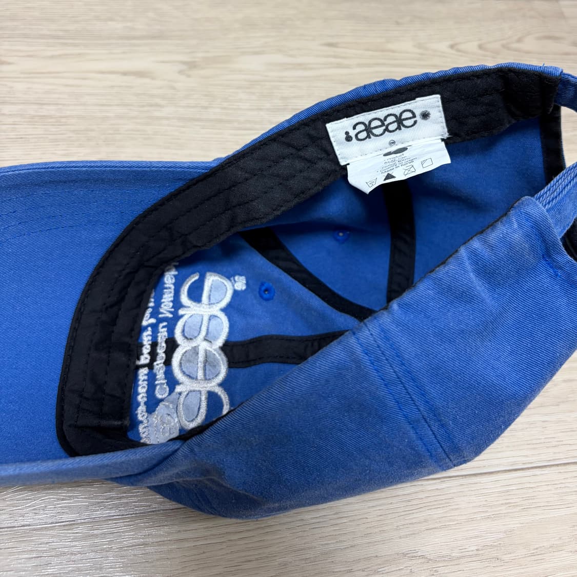 aeae 에이이에이이 웹 로고 데미지 볼캡 블루 상품이미지2