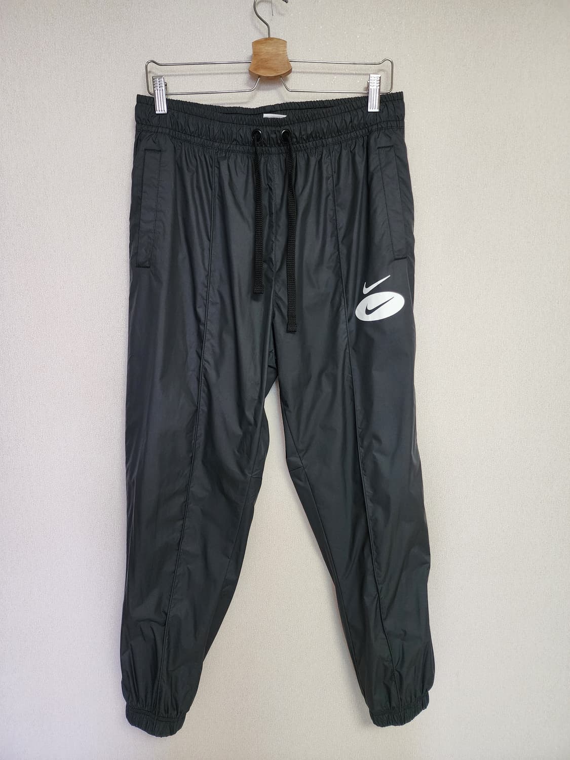 나이키 스우시 블랙 바람막이 조거 팬츠 상품이미지1