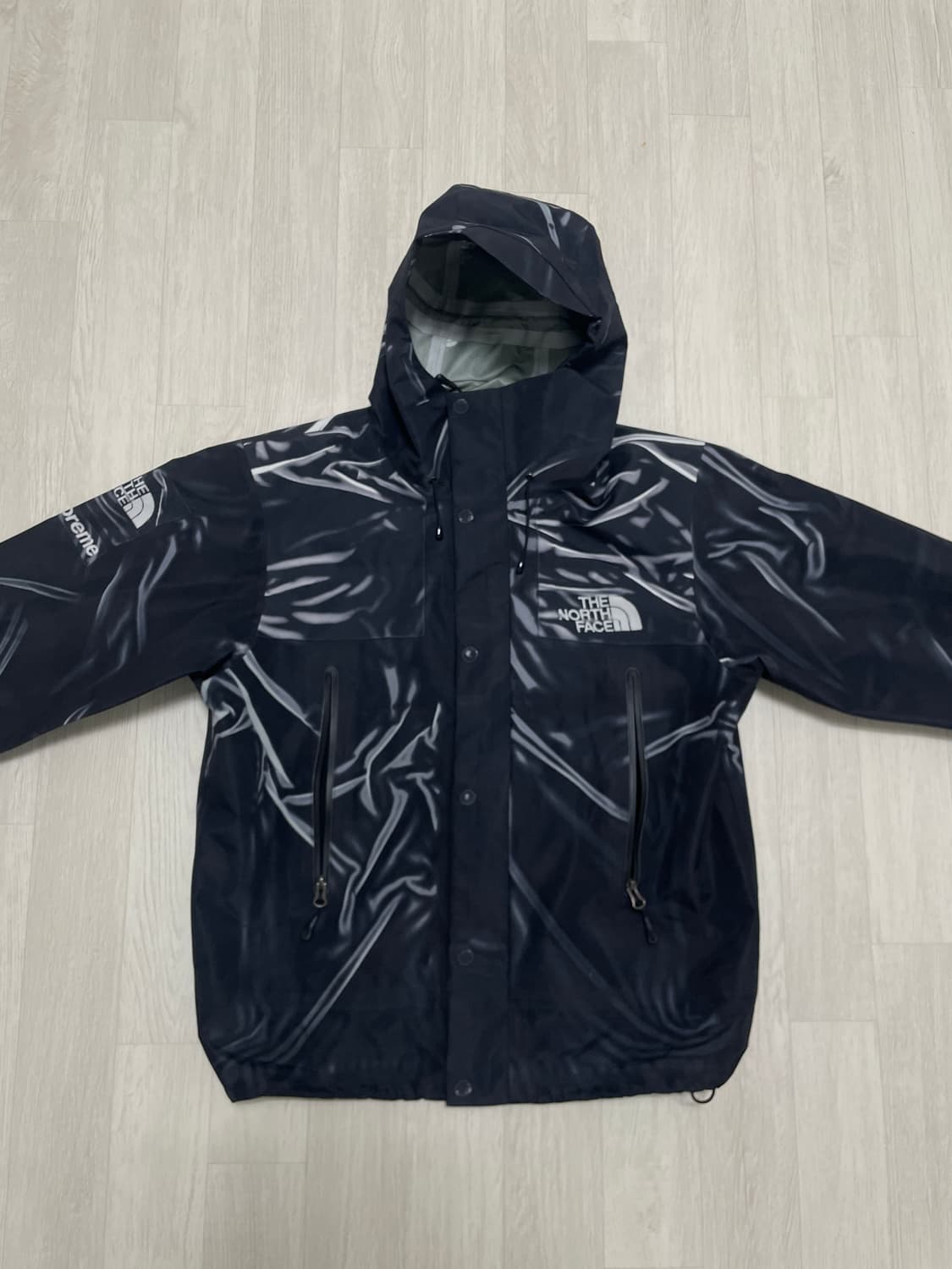 [S]슈프림 x 노스페이스 트롱프 뢰유 프린티드 테입드 심 쉘 상품이미지1