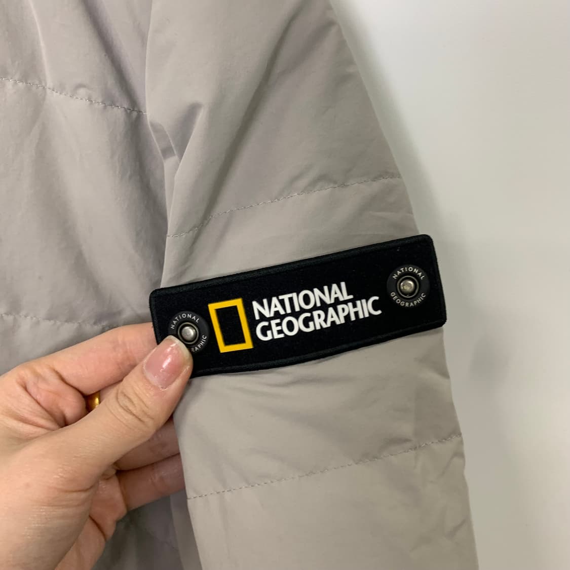 내셔널지오그래픽 와펜 베이지 경량 패딩 상품이미지4