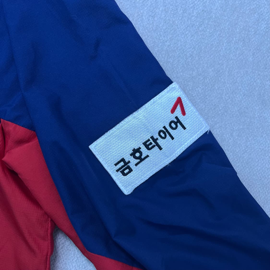 100 마제스틱 기아타이거즈 나일론 반집업 웜업 상품이미지5