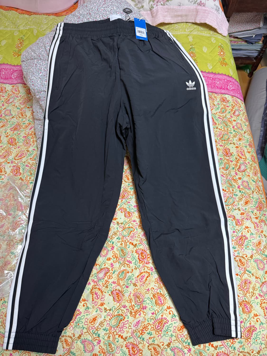 아디다스 아디컬러 우븐 파이어버드 트랙 팬츠 블랙 판매합니다. 상품이미지1