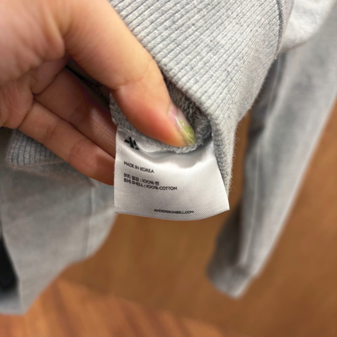 앤더슨벨 후드티 로고 그래픽 프린팅 드로우 스트링 디테일 레귤러핏 그레이 상품이미지7