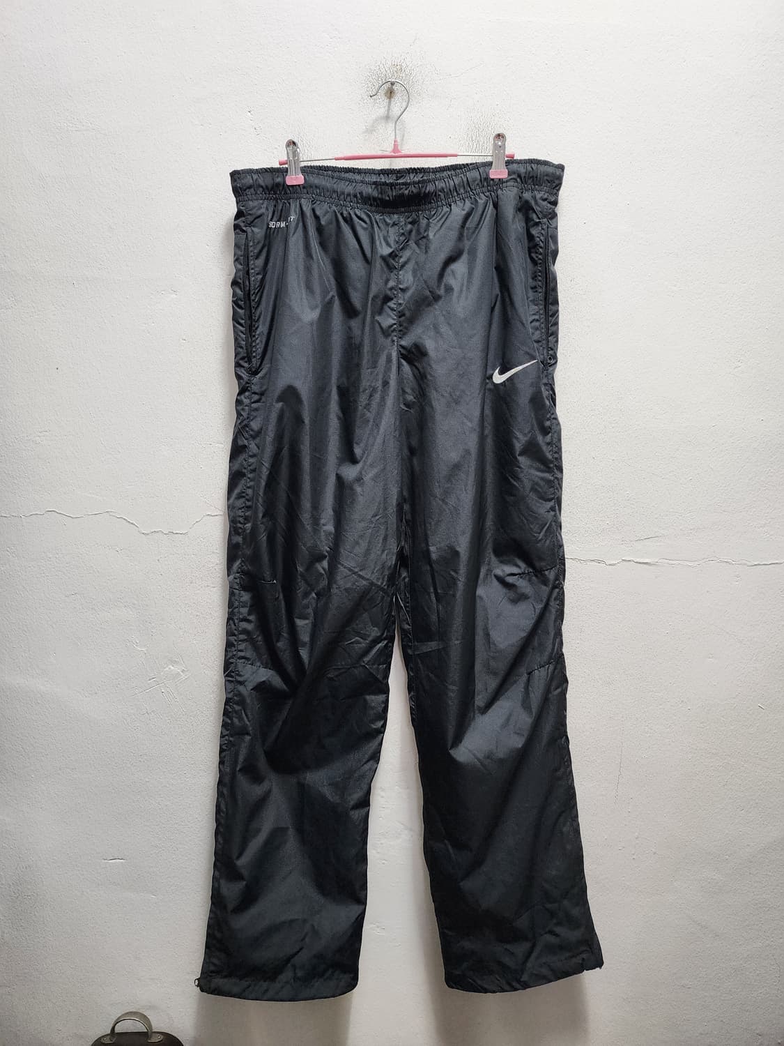 나이키 스톰핏 와이드 나일론 팬츠 상품이미지1