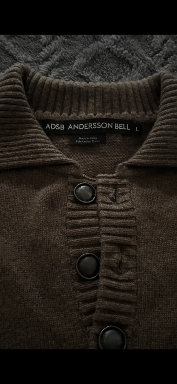 앤더슨벨 컷아웃 폴로 스웨터 상품이미지1