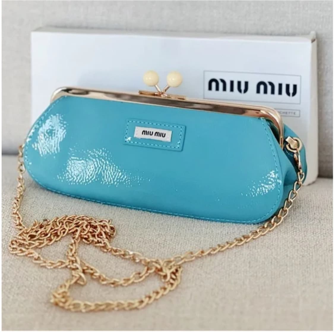 미우미우 체인 클러치백 상품이미지1