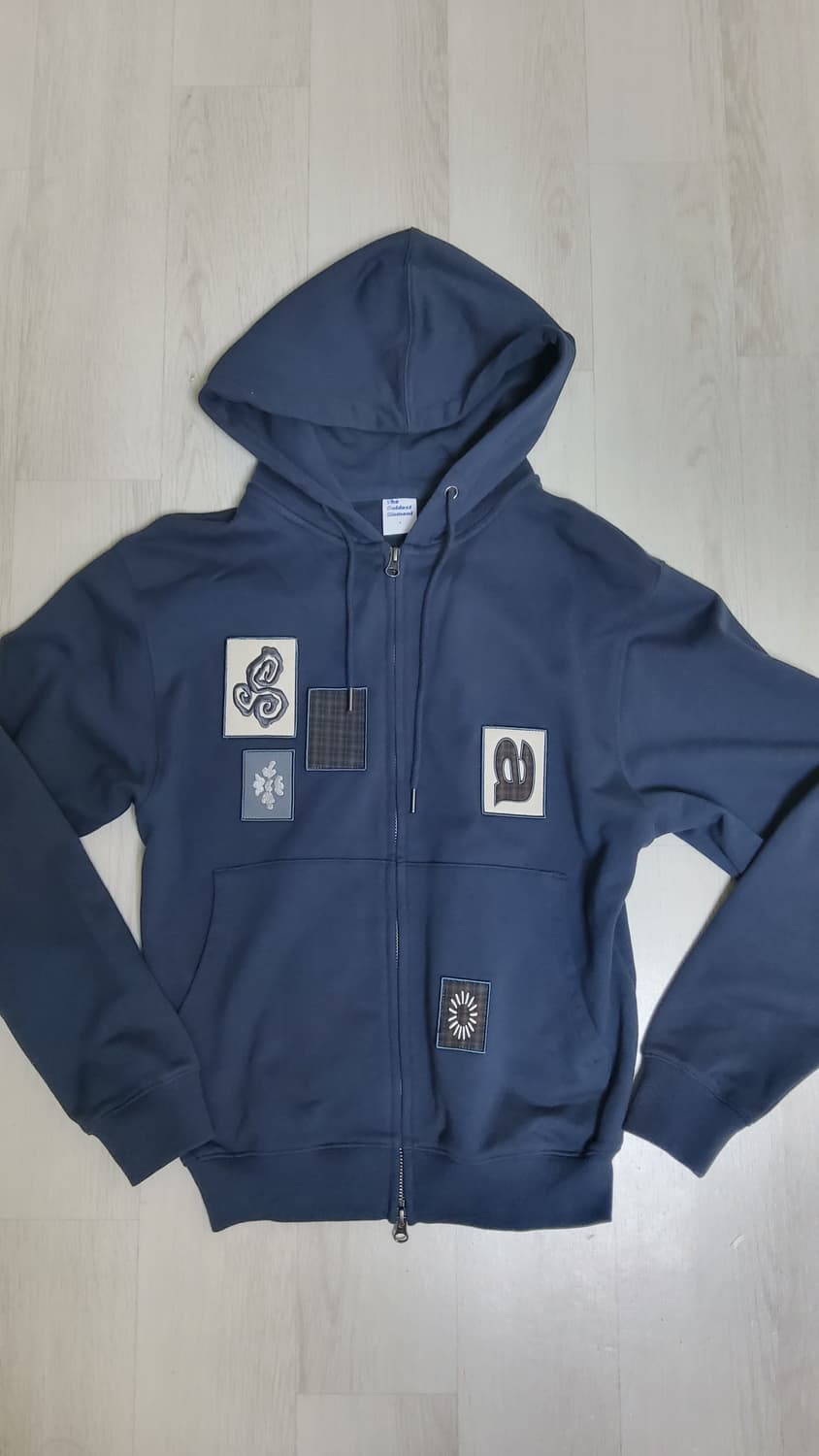 더콜디스트모먼트 후드집업 상품이미지1