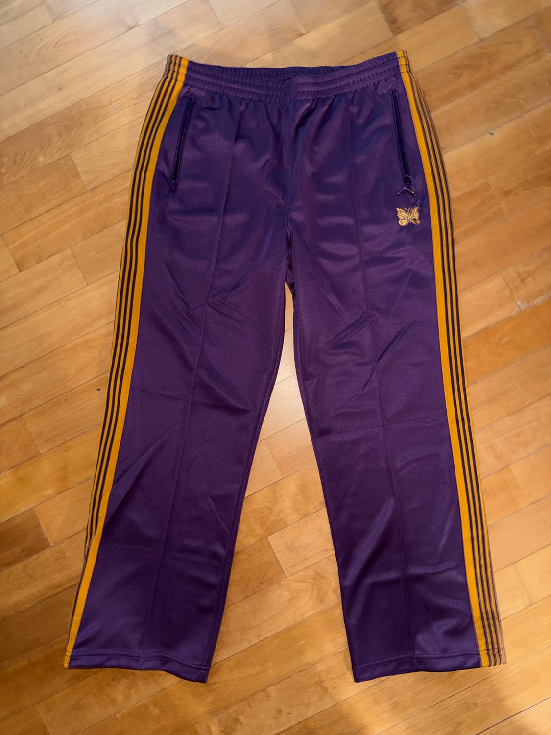 니들스 트랙팬트 상품이미지1