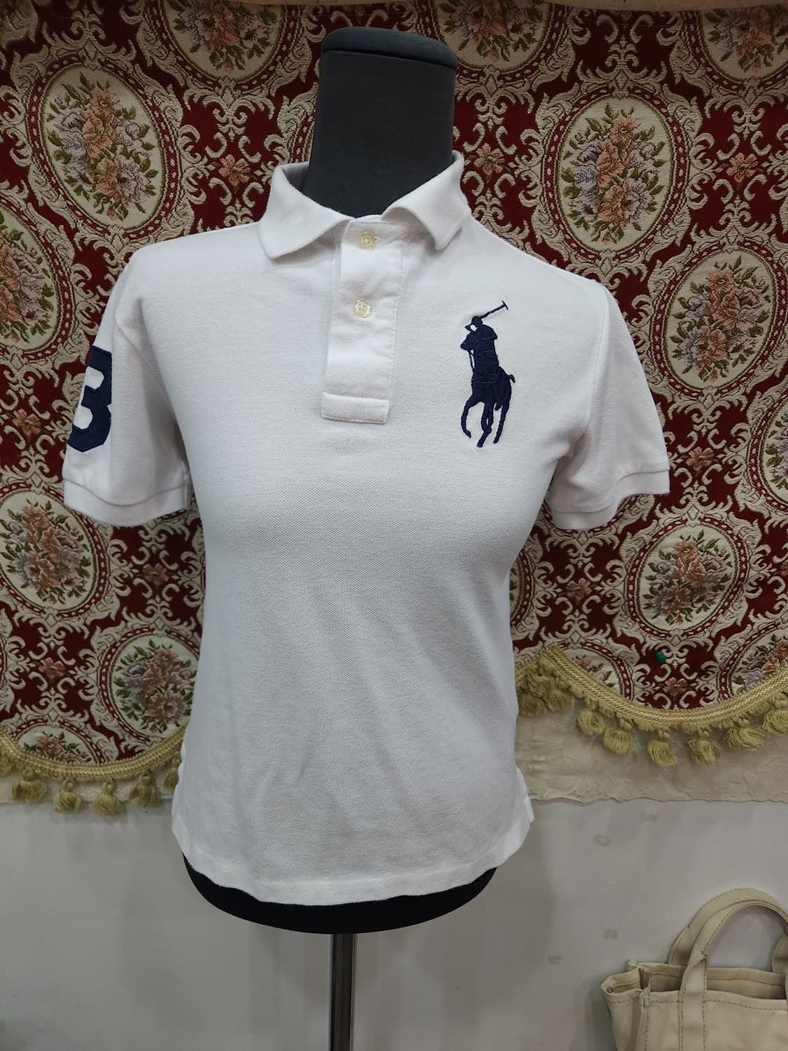 폴로 랄프로렌 화이트 빅포니 카라 반팔

 상품이미지1