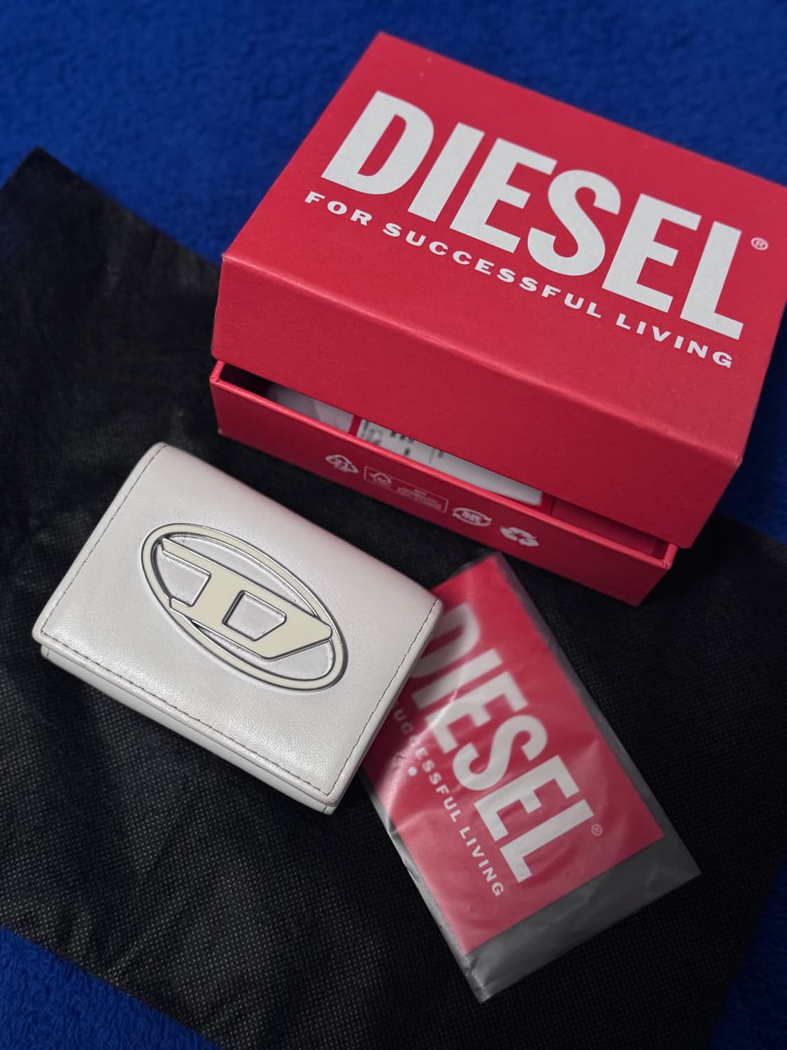 디젤 1DR 트라이폴드 반지갑 화이트 상품이미지1