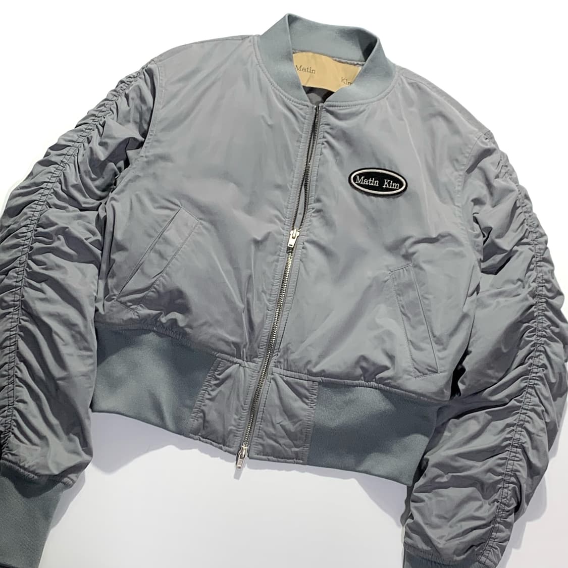 마뗑킴 크롭 셔링 봄버 상품이미지1