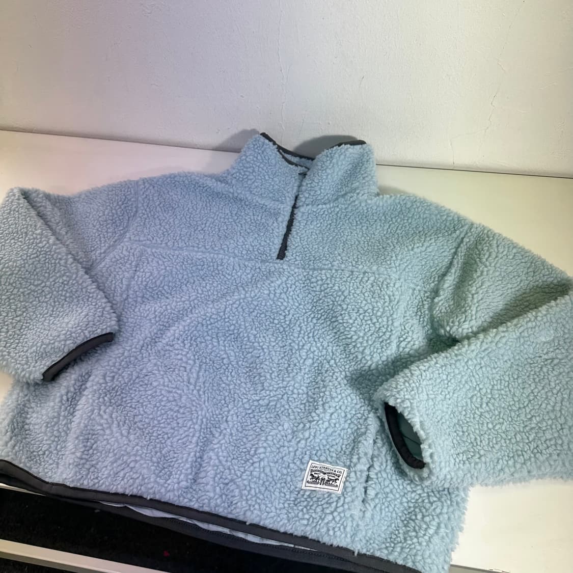 우먼OS 리바이스 스카이블루 오버핏 반집업후리스 상품이미지1