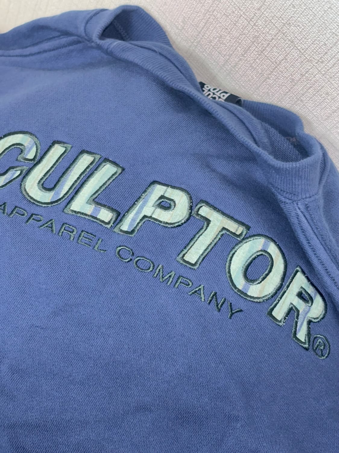 스컬프터 로고 체크패치 맨투맨 상품이미지1