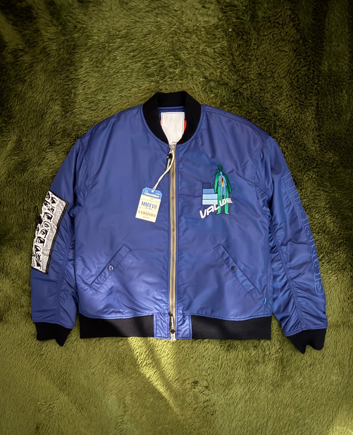 [L] Liberaiders 리버레이더스 디클라인 자수 로고 봄버 자켓 상품이미지1